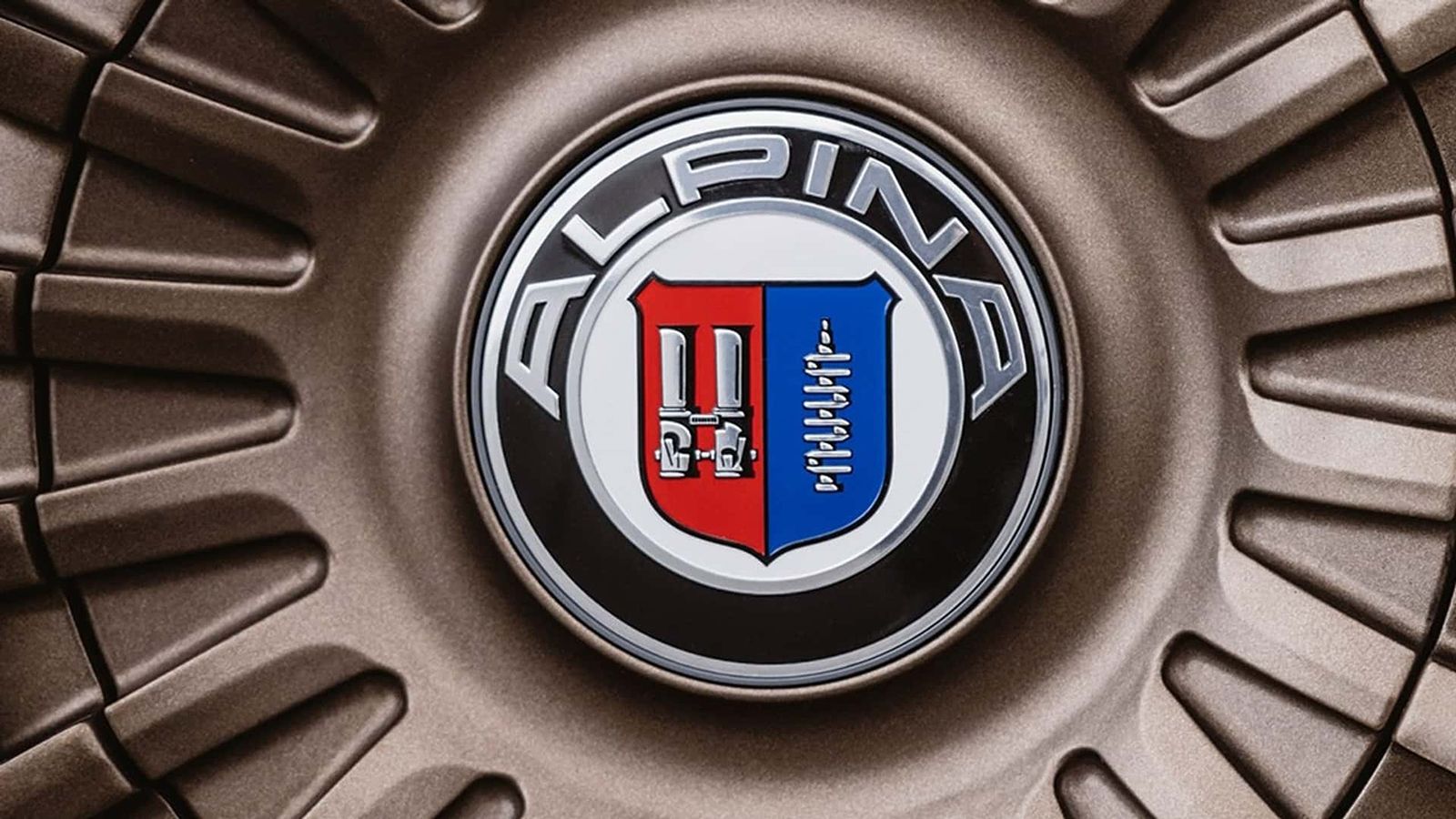 To προηγούμενο λογότυπο της Alpina.